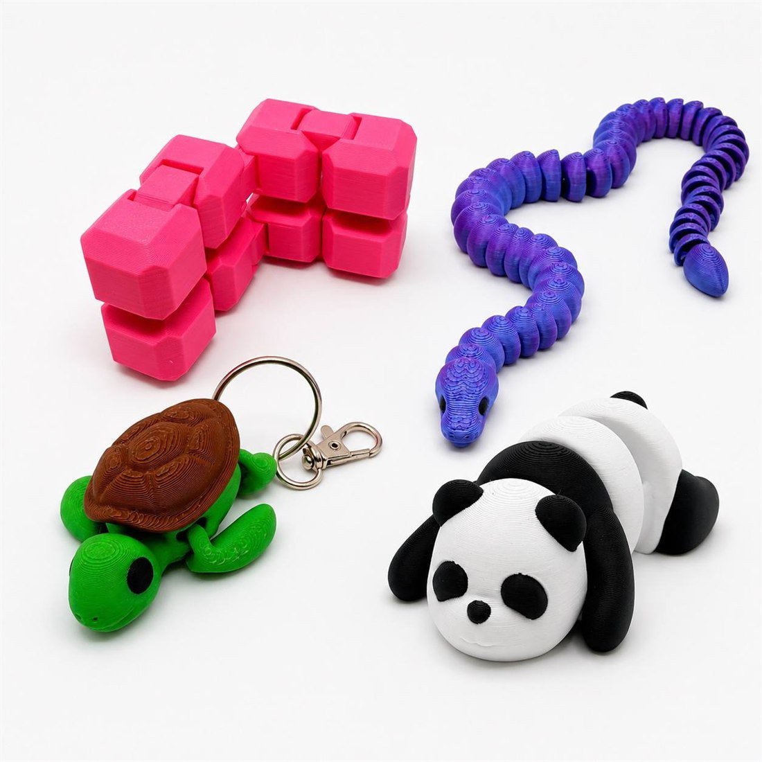 Cubo, serpente, tartaruga e panda della collezione AIRA insieme