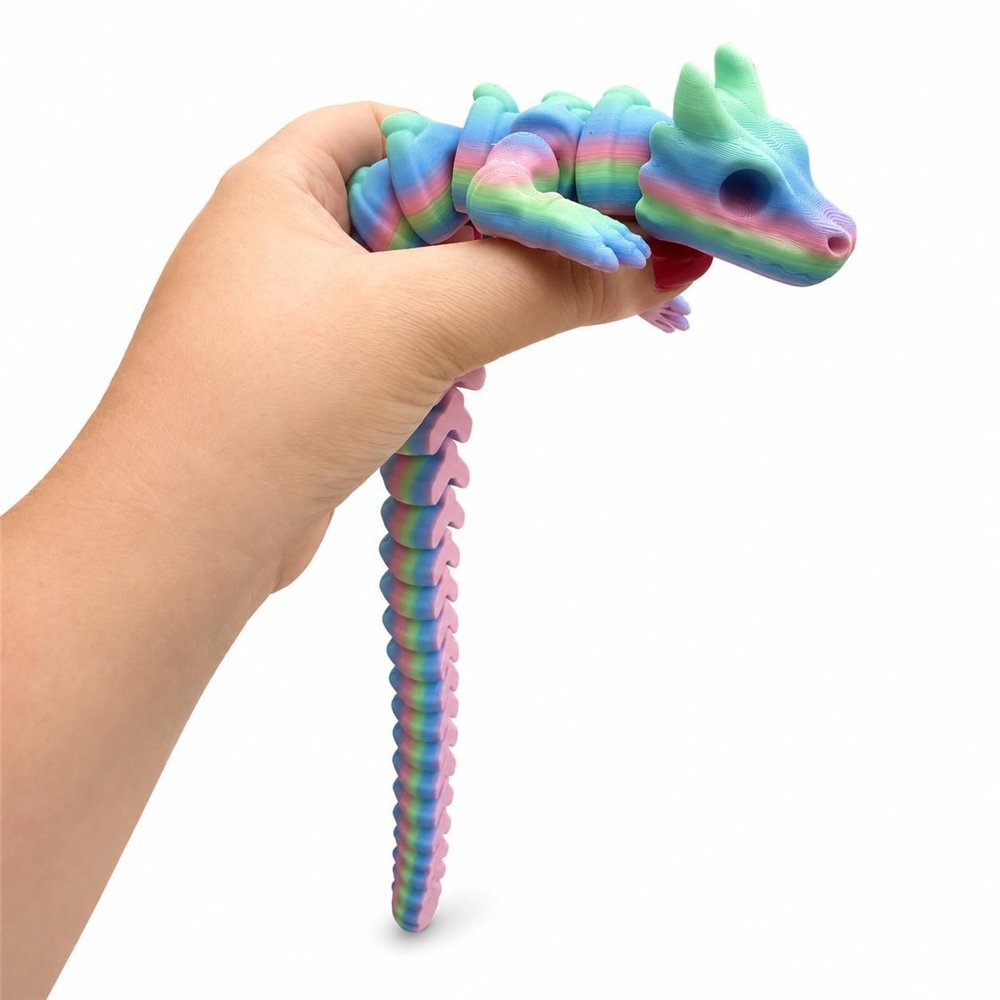 Un fidget AIRA Flow arcobaleno che scorre fra le dita di una mano