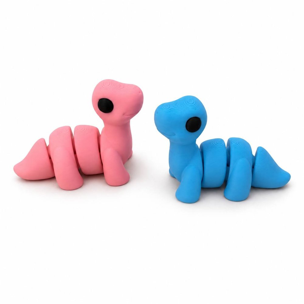 Due dinosauri AIRA snodabili, uno rosa e uno azzurro