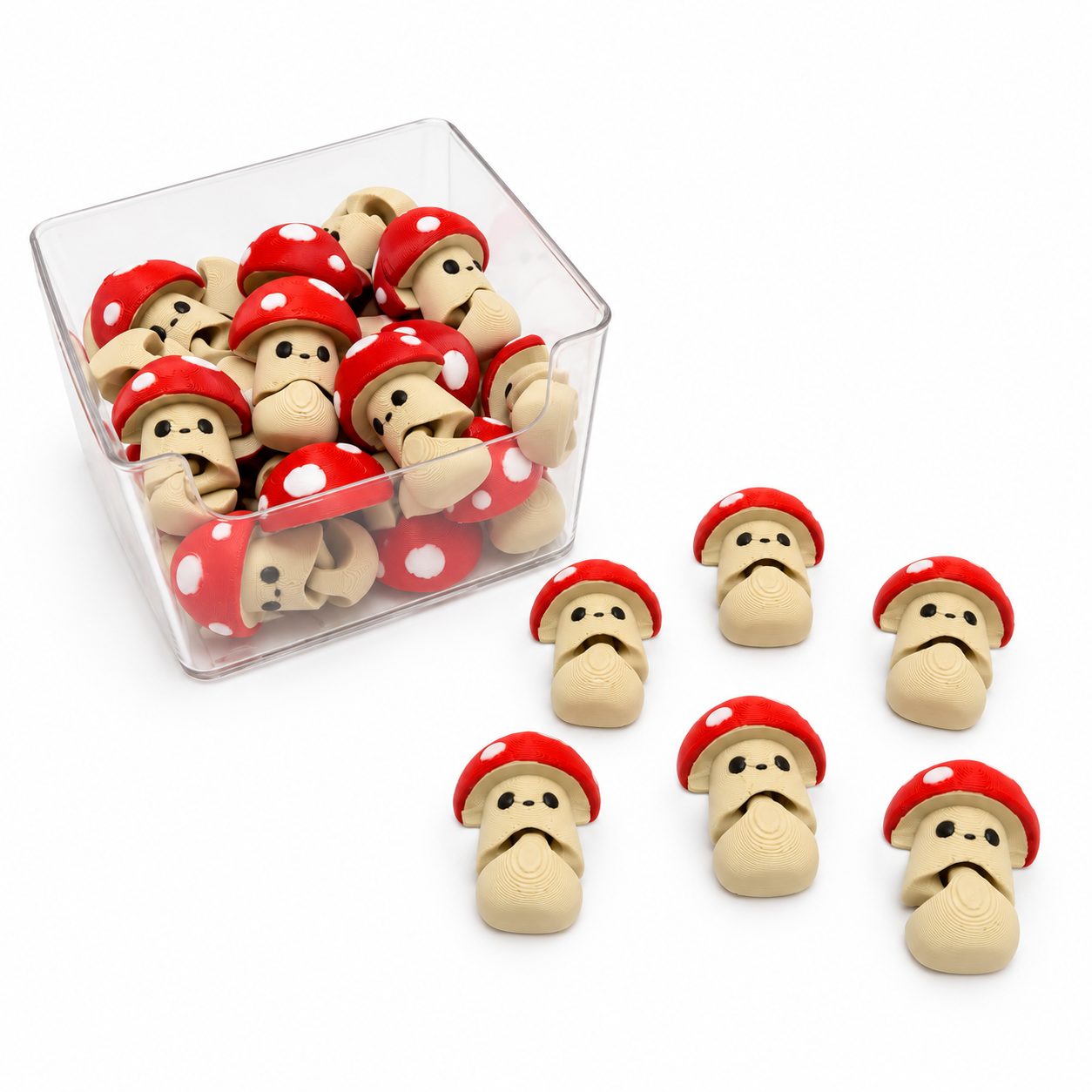 AIRA Mini Fungo Rosso Flexi, fidget toy sensoriale articolato con cappello rosso a pois bianchi, corpo color crema e visino kawaii, design originale 3D Mind Lab.